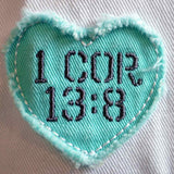 love-never-fails-womens-religious-cap-cherished-girl